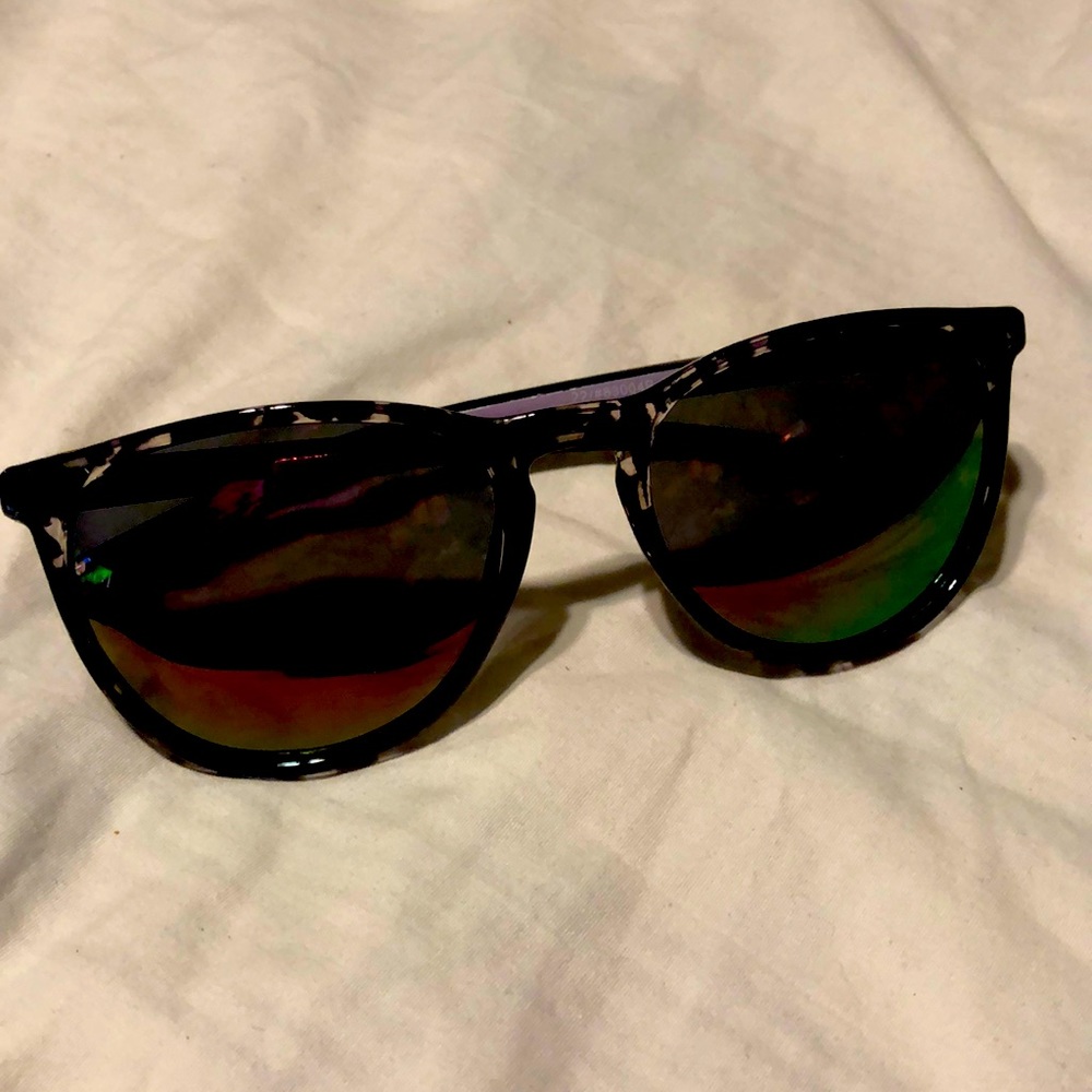 Black and clear framed sunglasses